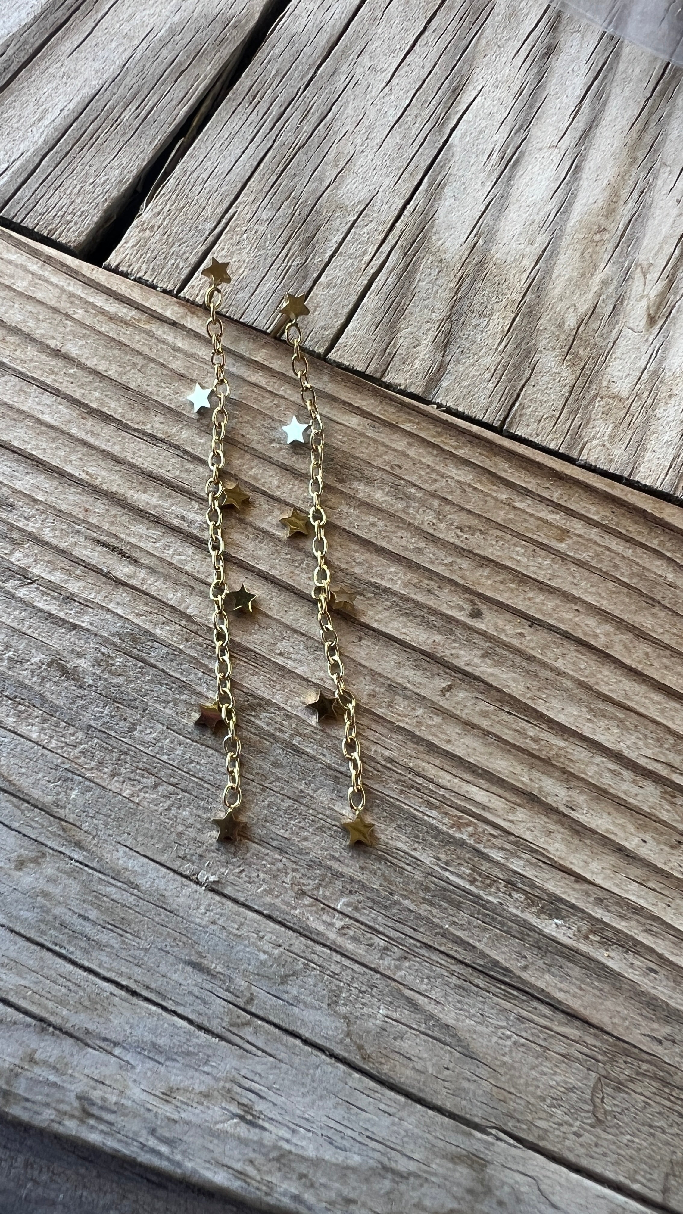 PENDIENTES LARGOS CADENITA ESTRELLAS