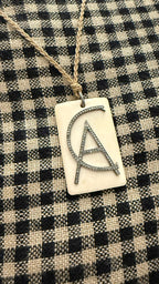 COLGANTE CHAPA HUESO Y DIAMANTES
