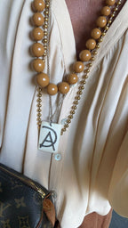 COLGANTE CHAPA HUESO Y DIAMANTES